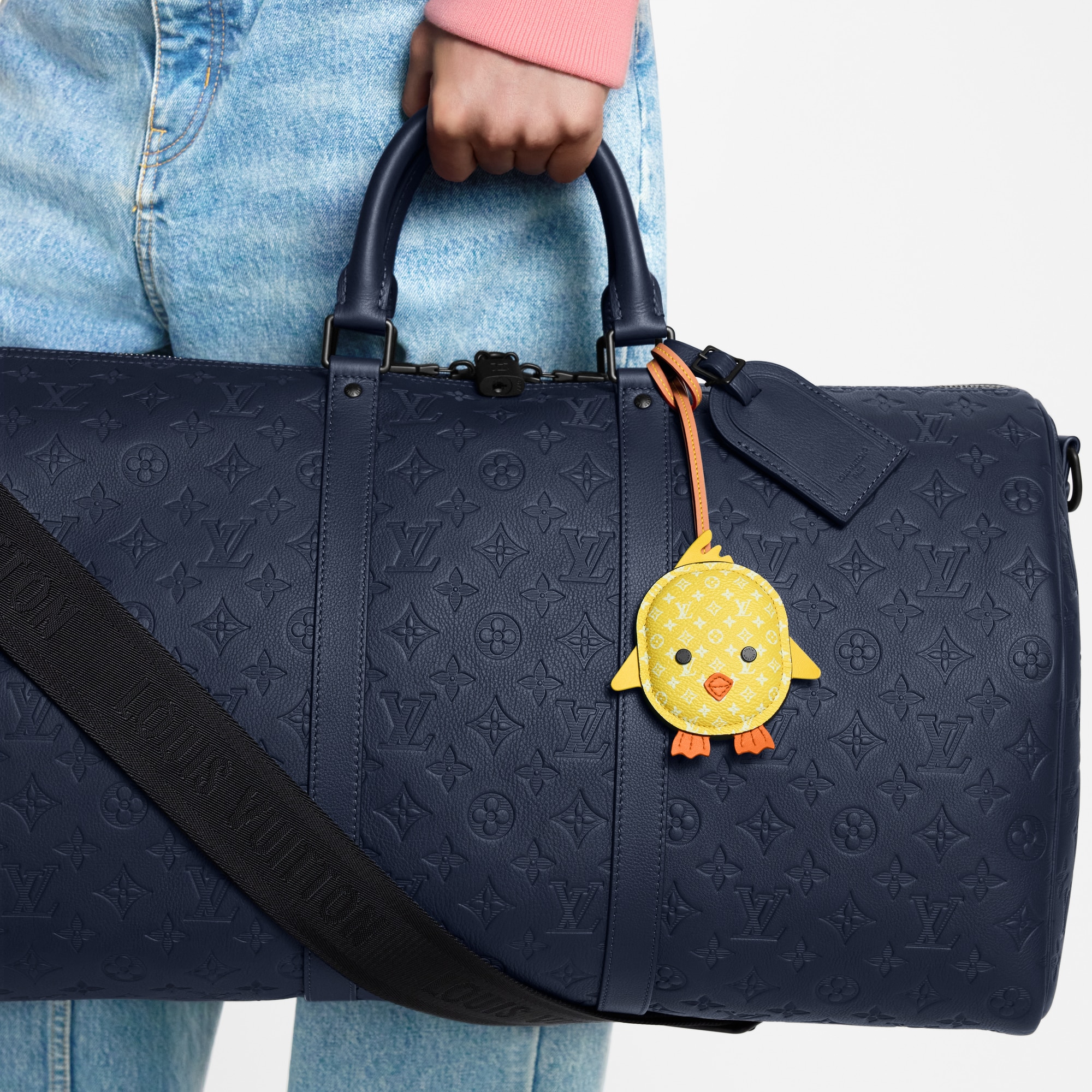 LV Pulcino Bag Charm . in Men