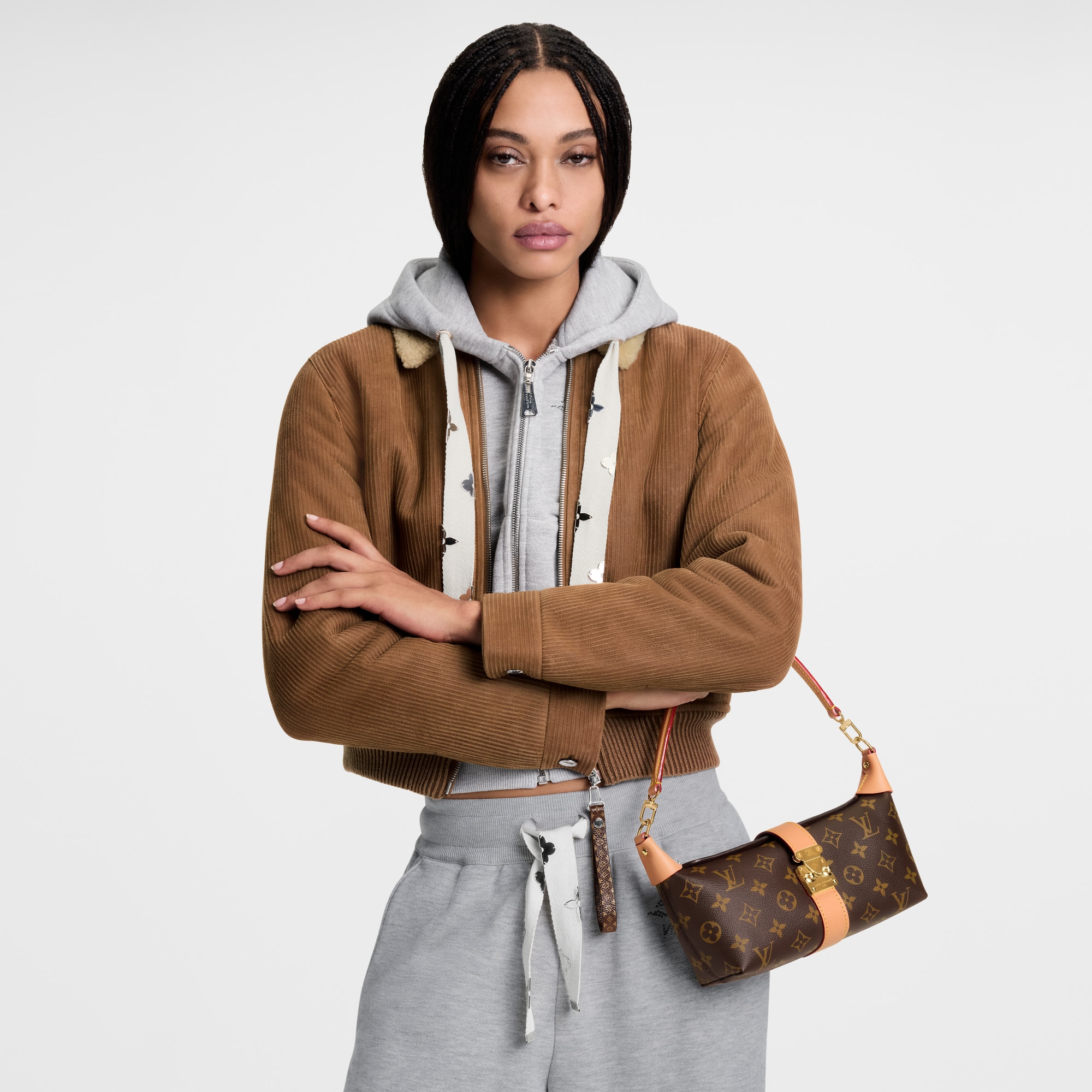 Pochette Mia Monogram in Women