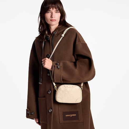 Tiny Camera Bag Monogram Empreinte Leather in Women's Wallets and Small Leather Goods Wallets on Chain and Micro Bags collections by Louis Vuitton (Product zoom)