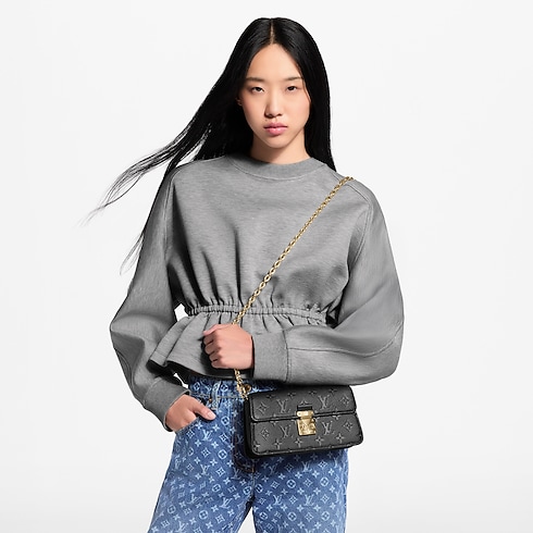 Wallet On Chain Métis Monogram Empreinte Leather in Women's Wallets and Small Leather Goods Nano Bags and Chain Wallets collections by Louis Vuitton (Product zoom)